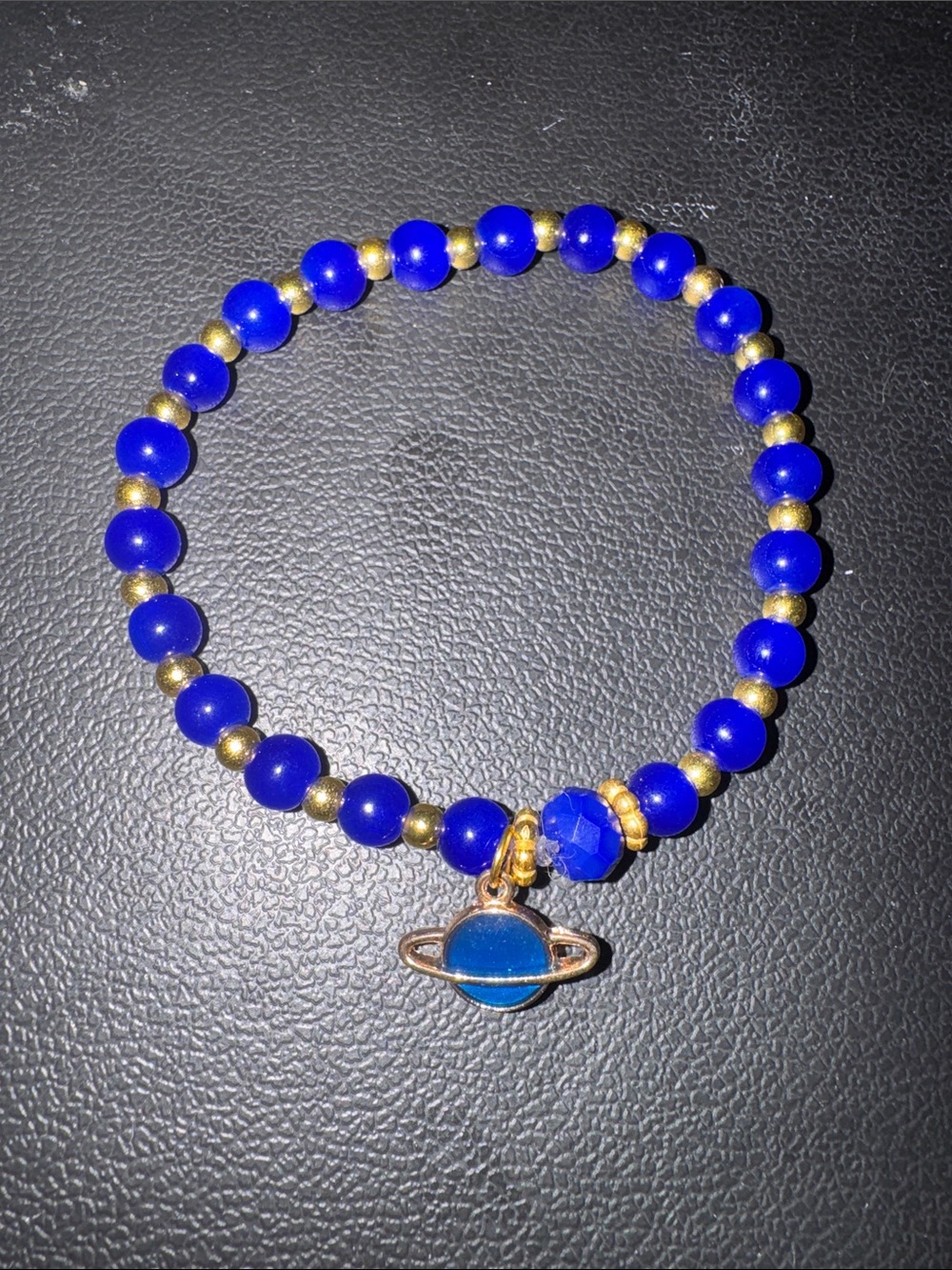 Gold-Accent Blue Beaded Bracelet with Planet Charm